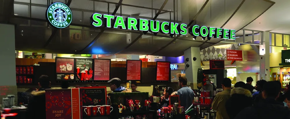 Figure 3.1 Starbucks, based in Seattle, Washington, is a company with more than 250,000 employees and locations across the globe. It directly affects countless stakeholders beyond its institutional investors and millions of customers, from coffee growers and milk producers, to urban and suburban communities and developers, to local, state, and national governments. (credit: modification of “StarbucksVaughanMills” by “Raysonho”/Wikimedia Commons, CC0)