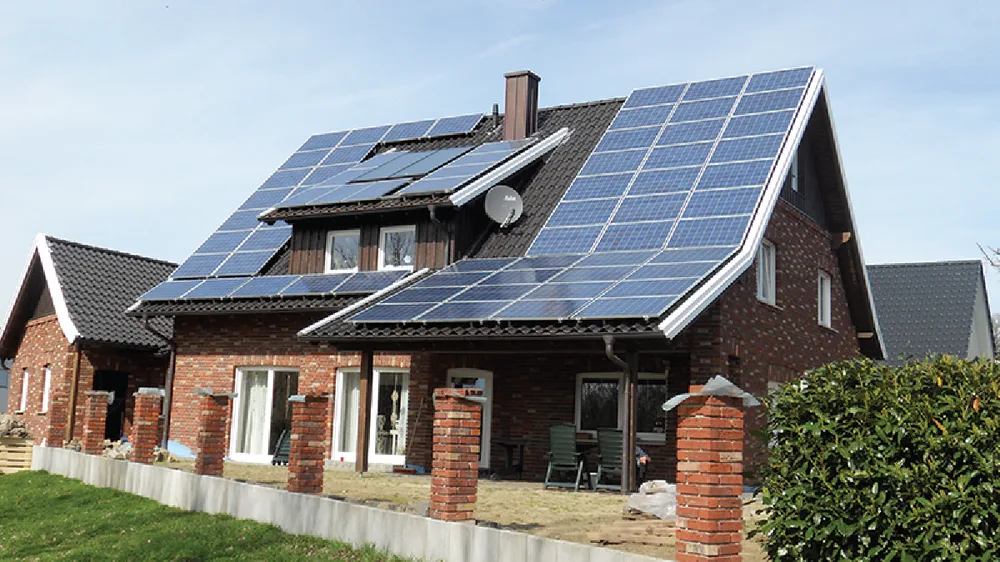Figure 4.9 Although solar panels can reduce your carbon footprint, the tiles are much more expensive than standard roofing tiles. (credit: “Typical Solar Installation” by Tim Fuller/Flickr, CC BY 2.0)