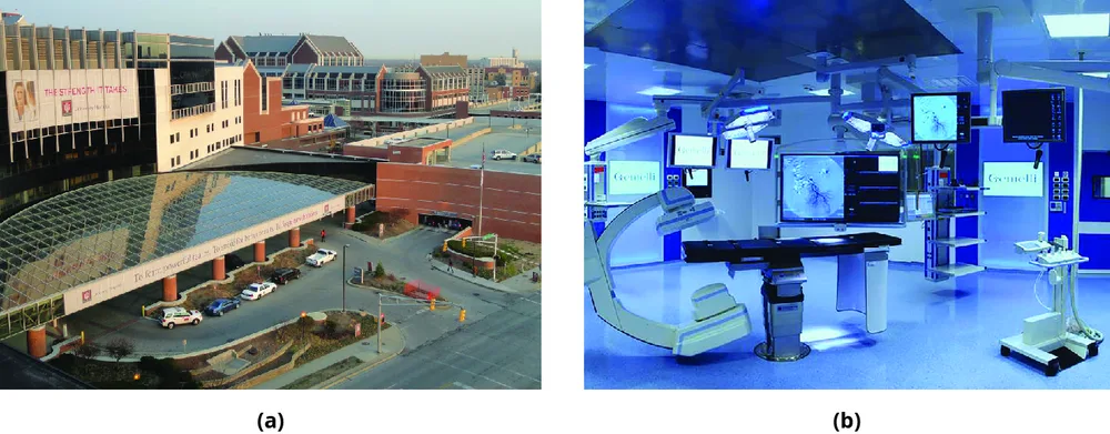 Figure 9.5 The Indiana University Health University Hospital (a) is an example of a contemporary medical center affiliated with a university medical school, in this case on the Indiana University–Purdue University Indianapolis campus. This is indicative of a common partnership through which hospitalization and medical-school education are made available in the United States. This type of affiliation also exists abroad, as evidenced by this state-of-the-art operating facility (b) at the Gemelli University Hospital in Rome, Italy. (credit a: modification of “Indiana University Hospital - IUPUI - DSC00508” by “Daderot”/Wikimedia Commons, Public Domain; credit b: modification of “Hybrid operating room for cardiovascular surgery at Gemelli Hospital in Rome” by “Pfree2014”/Wikimedia Commons, CC0)