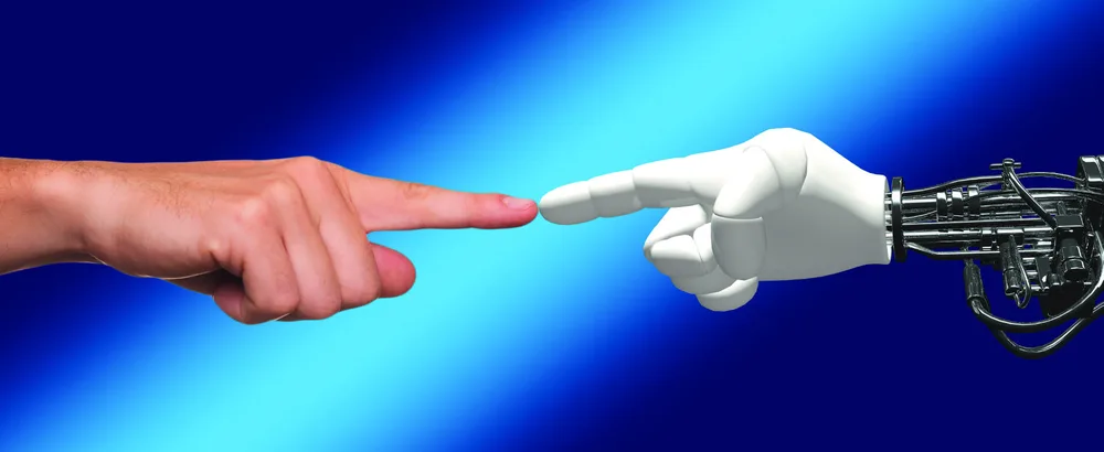 Figure 10.1 Ethical managers will understand new business models and the new economies being driven by technological advances and the rise of robotics and artificial intelligence in the workplace. (credit: modification of “hand robot human divine spark” by “geralt”/Pixabay, CC0)